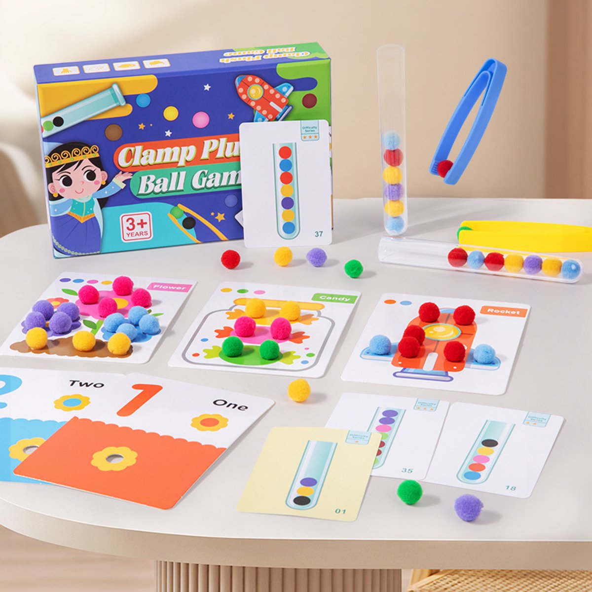 Kerstspeelgoed voor kinderen, een reageerbuisbalklemspel, een educatief speelgoed voor kinderen waarbij kleuren bij elkaar moeten passen.